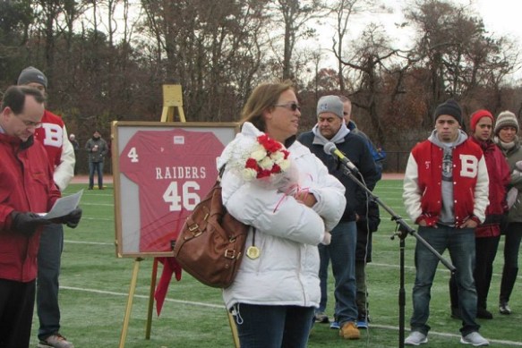 Jan Anderson graciously thanks Barnstable High School, the Barnstable Quarterback Club, and others for retiring her son's jersey on Thanksgiving Day. 