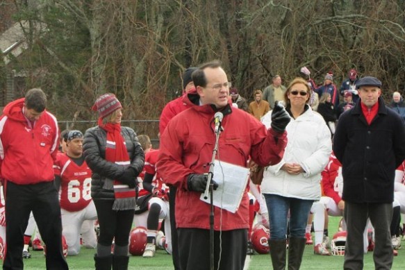 State Representative Brian Mannal speaks in honor of Kevin Houston. As children, the two men were teammates with the Barnstable Silver Bullets.